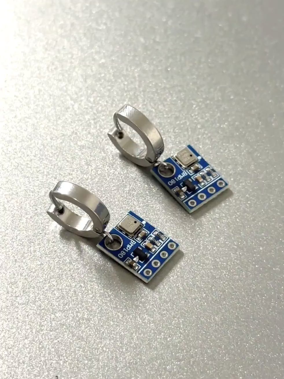 Individuality is not defined: board lock earrings